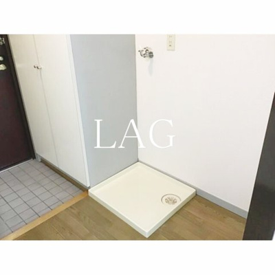 【設備】 | 本間ビル | 室内洗濯機置き場です。