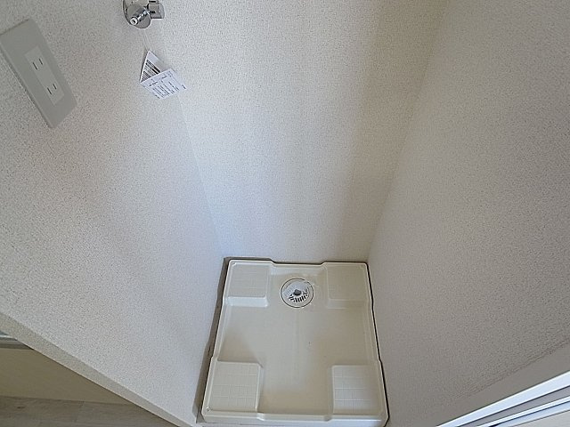 ハイツ湊川の洗面所|室内洗濯機置き場を設置してます