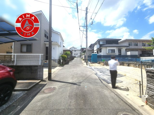 福岡市南区老司5丁目第6-1棟（1号棟）の外観|前面道路含む現地の写真です。