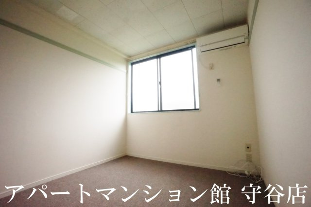 レオパレス吉春の寝室
