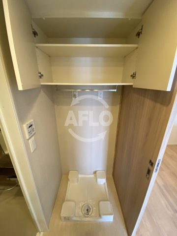 ロジュマンタワー梅田　扇町小学校区の洗面所|ロジュマンタワー梅田　室内洗濯機置き場
