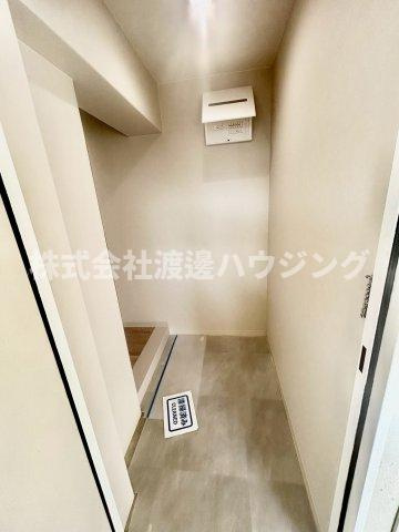 プログレッソ寝屋川の玄関