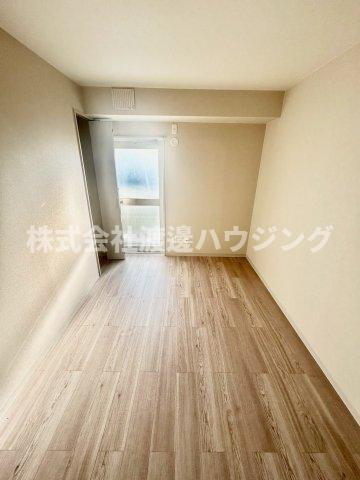 プログレッソ寝屋川の洋室