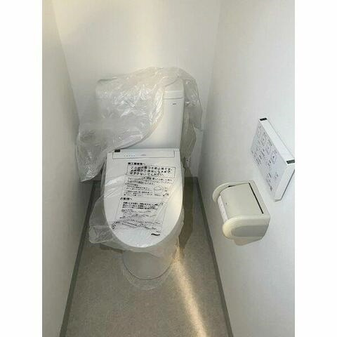 藤沢市藤沢の賃貸マンションのトイレ
