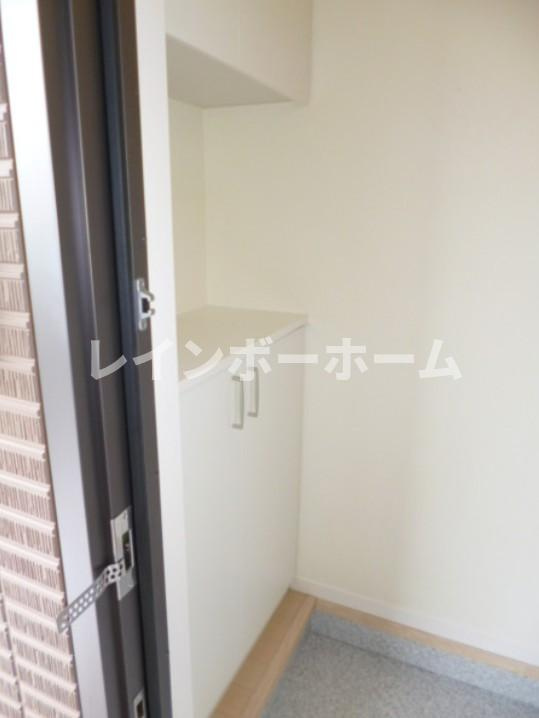 ルミエール磯の玄関