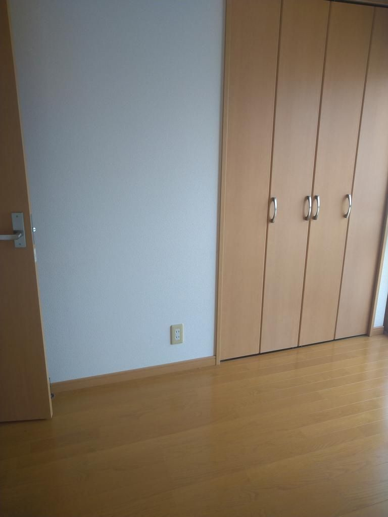 明生ビルの寝室