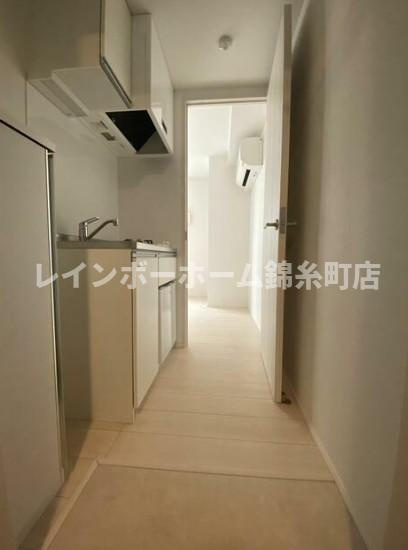 楽信マンションの玄関