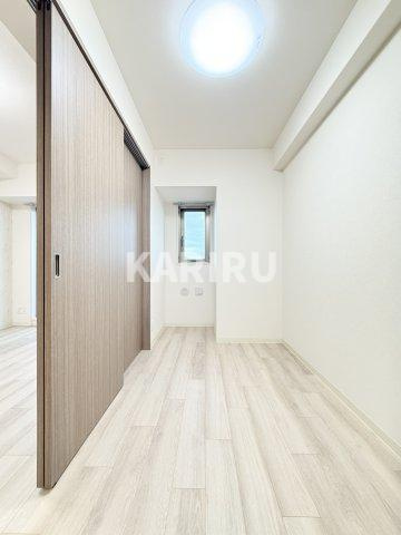 プレサンスOSAKA東中本エシデルの寝室