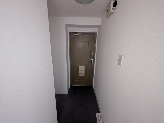 ホワイトハイツカドタの玄関