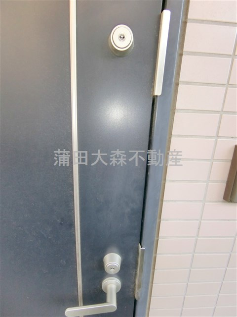 コスモリード蓮沼の玄関