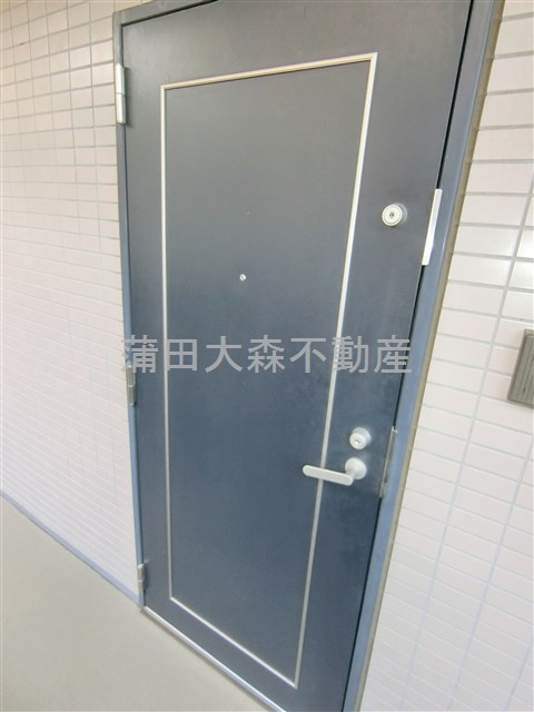 コスモリード蓮沼の玄関