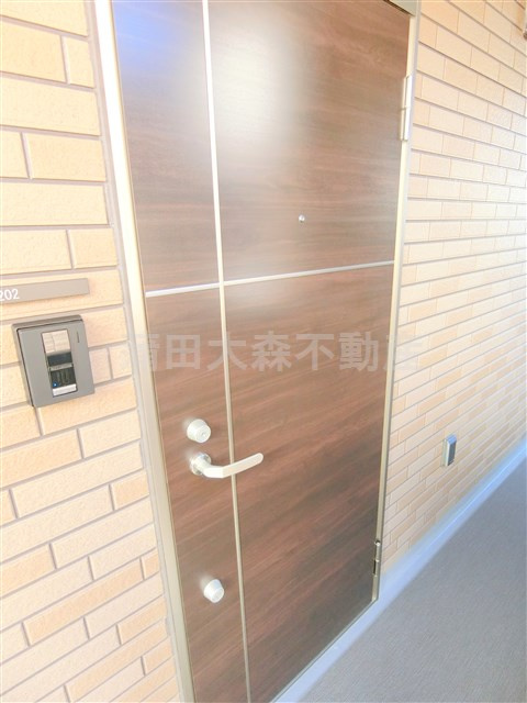 グランクオール梅屋敷の玄関