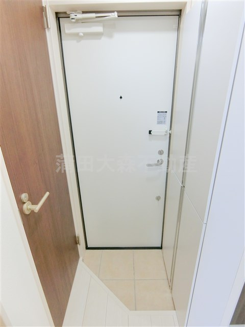 グランクオール梅屋敷の玄関