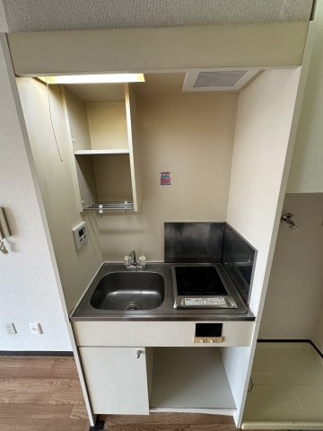 スカイコート向ヶ丘第2のキッチン|コンパクトなキッチンで掃除もラクラク