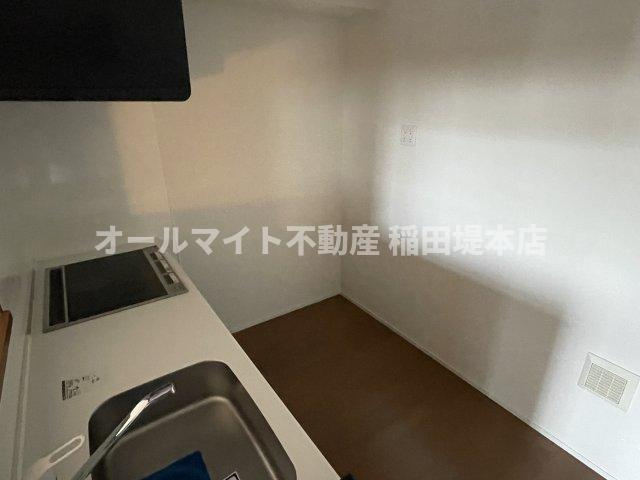 稲城市東長沼のアパートのキッチン