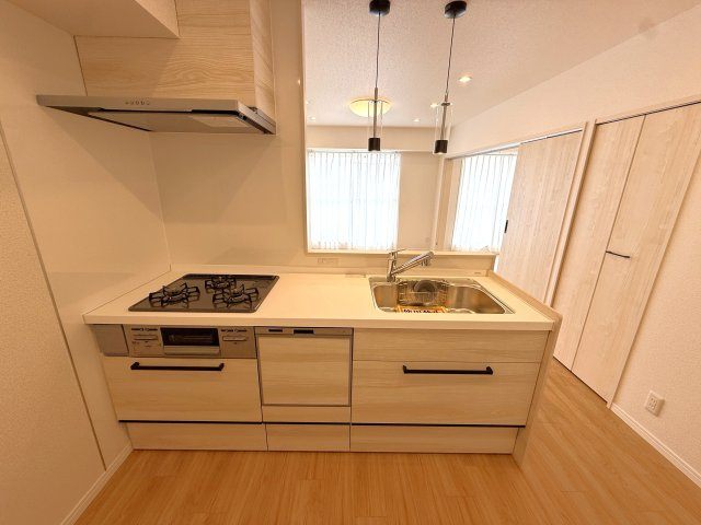 植田ダイヤハイツのキッチン|コンパクトなキッチンで掃除もラクラク