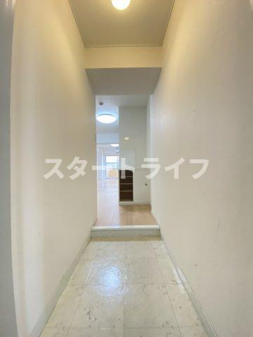 大阪市淀川区木川東３丁目の賃貸マンションの玄関