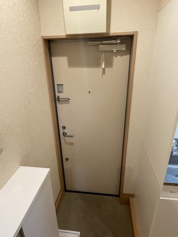 草加市草加２丁目のアパートの玄関
