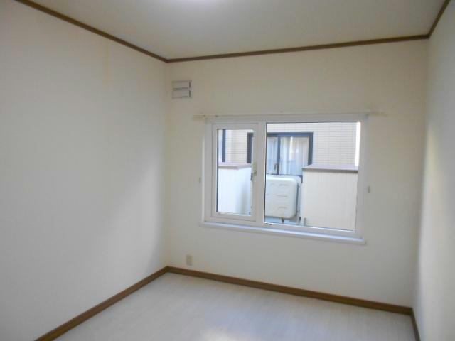 カレッジサイドの洋室