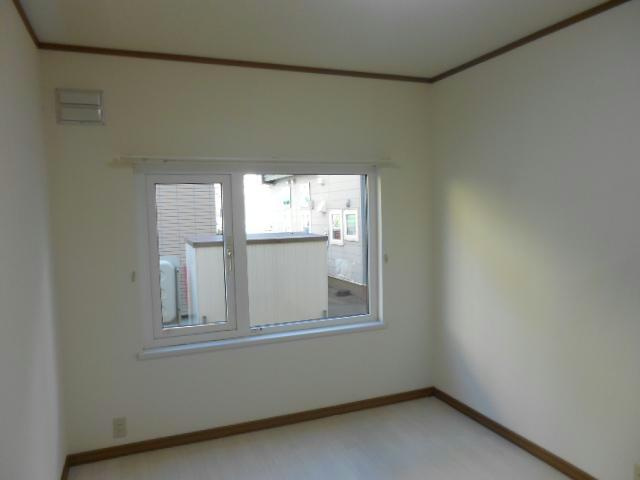 カレッジサイドの洋室