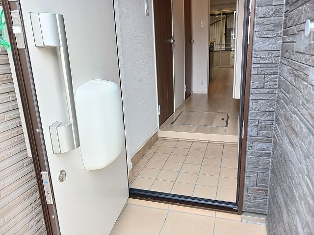 ルミエール明野の玄関