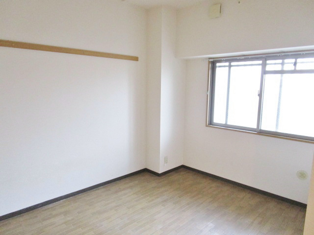 枚方市伊加賀西町の賃貸マンションの寝室