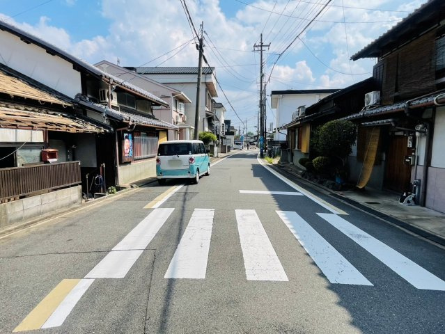 納所町　建築条件無土地の前面道路含む現地写真