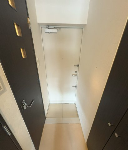 福岡市東区千早５丁目の賃貸マンションの玄関