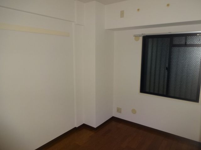 グランドエクセル東灘の寝室