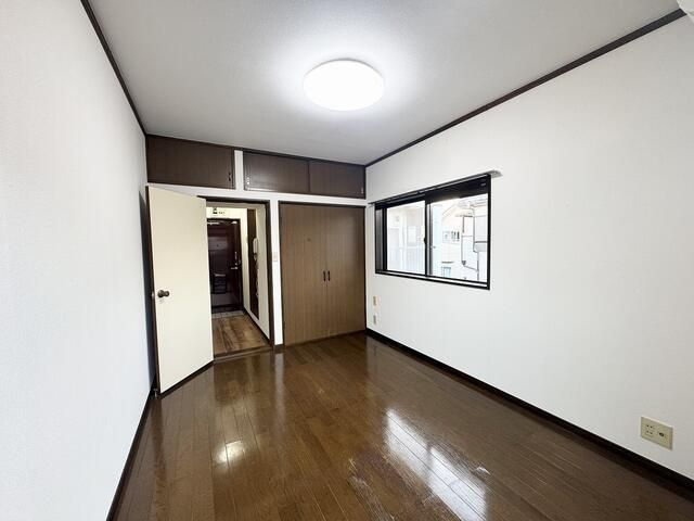 柏市豊四季のアパートの寝室