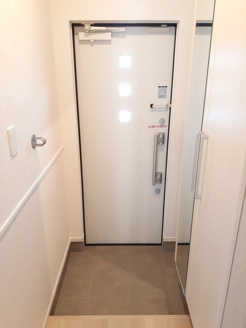 エスシー　トリアの玄関