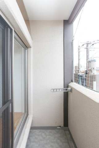 ダイナコートエスタディオ大濠公園Ⅱ　10階のバルコニー|別号室のもの（反転タイプ）です。現状優先になります。