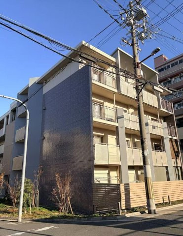 大阪市平野区加美正覚寺１丁目の一棟マンションの外観
