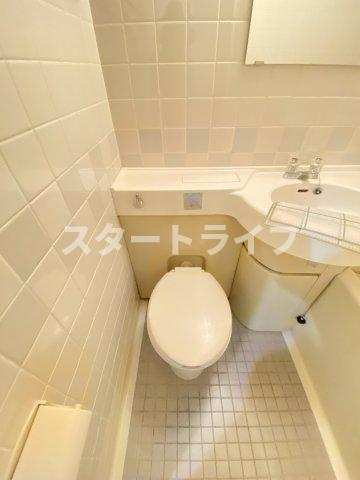 大阪市淀川区十三本町２丁目の賃貸マンションのトイレ