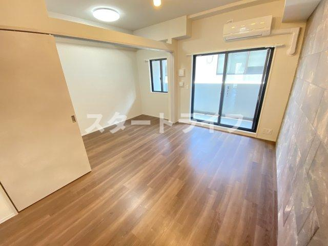 大阪市淀川区西宮原２丁目の賃貸マンションの居間・リビング