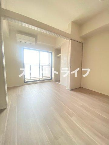 大阪市淀川区西宮原２丁目の賃貸マンションの寝室