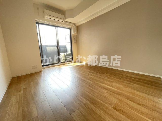 ワールドアイ都島駅前の居間・リビング