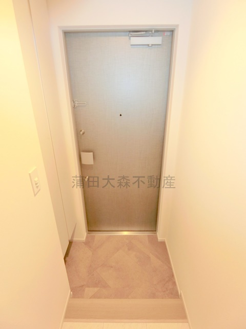 ルミーク大森の玄関