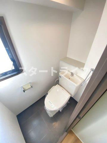 大阪市東淀川区東中島３丁目の賃貸マンションのトイレ