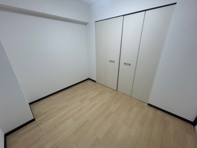 アーデンタワー本町イーストの洋室