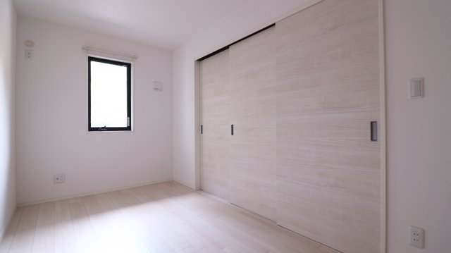 プレジール妙法寺の寝室