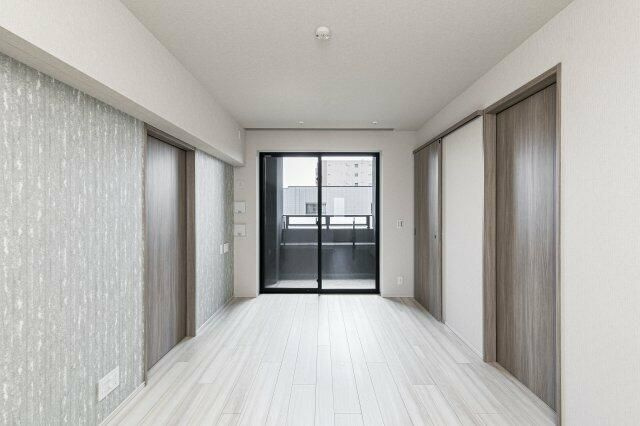 プレミアムレジデンス町屋の居間・リビング|こちらの居間で趣味の時間をお楽しみください