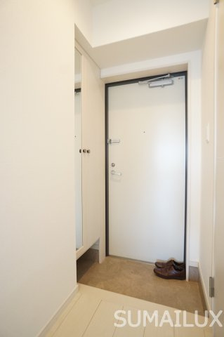 熊本市西区春日１丁目の賃貸マンションの玄関