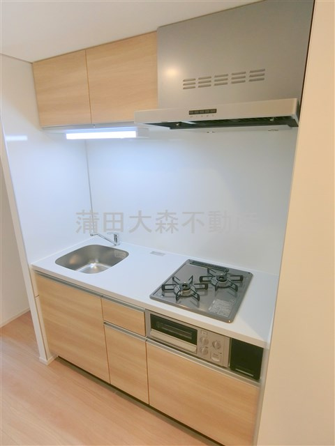 LUXENAラグゼナ平和島のキッチン|まな板がしっかりおける調理スペースのある2口ガスグリル付システムキッチン
