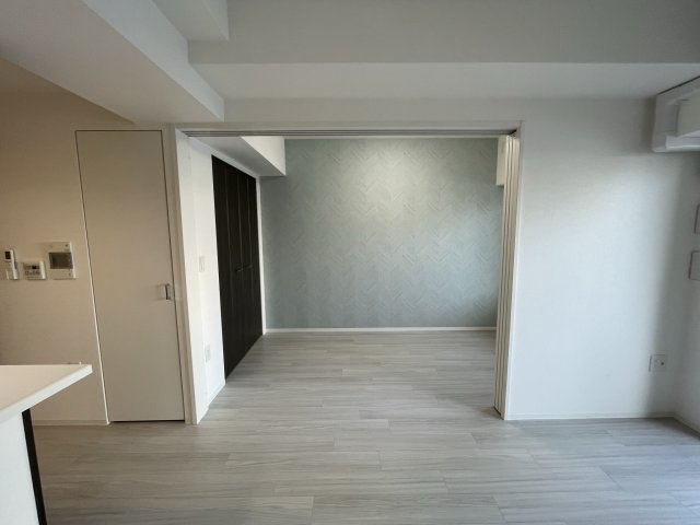 Dimus新大阪の居間・リビング|同マンション反転タイプの間取り写真