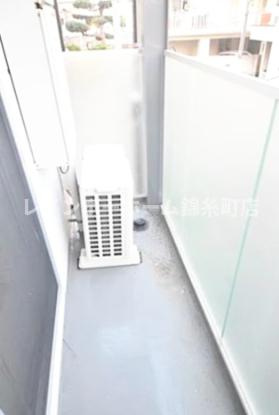 ルームス市川（E-073)のバルコニー