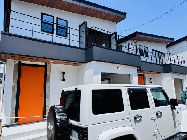 Life Begins in the Garage. 好きな時間が、家の中心になるの外観
