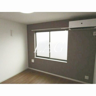 【居間・リビング】 | Ａｍｂｉｔｉｏｎ七里 | 洋室のお部屋です。