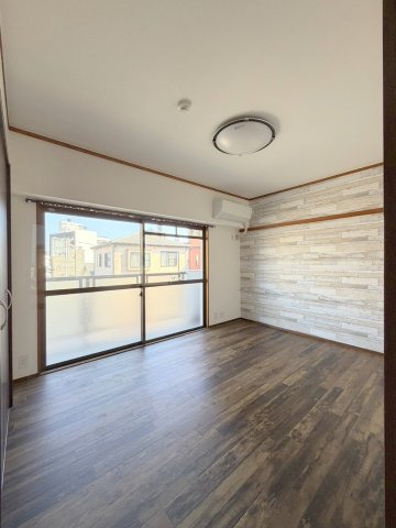 広島市西区中広町３丁目の賃貸マンションの居間・リビング
