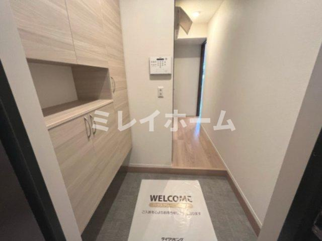 プルミエール新田の玄関